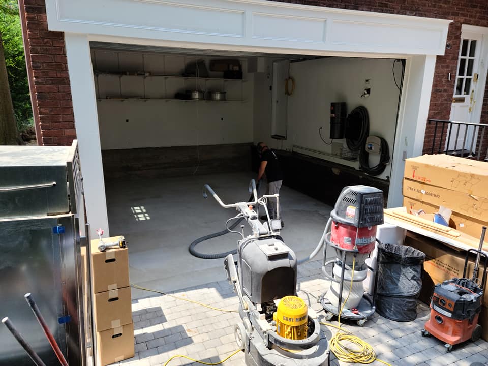 Concrete grinding and surface prep for grind-and-seal floor coating — Long Island NY